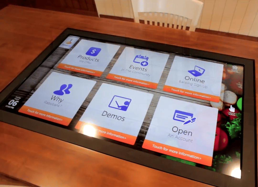 Table with interactive screen built in